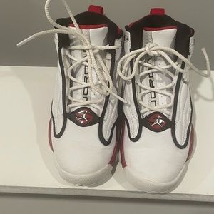 White with red and black kid Jordan